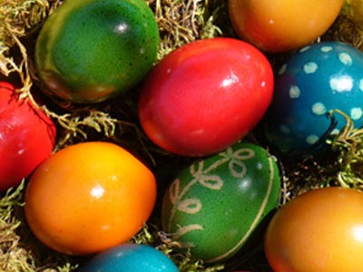 Red, yellow, blue and green Easter eggs.